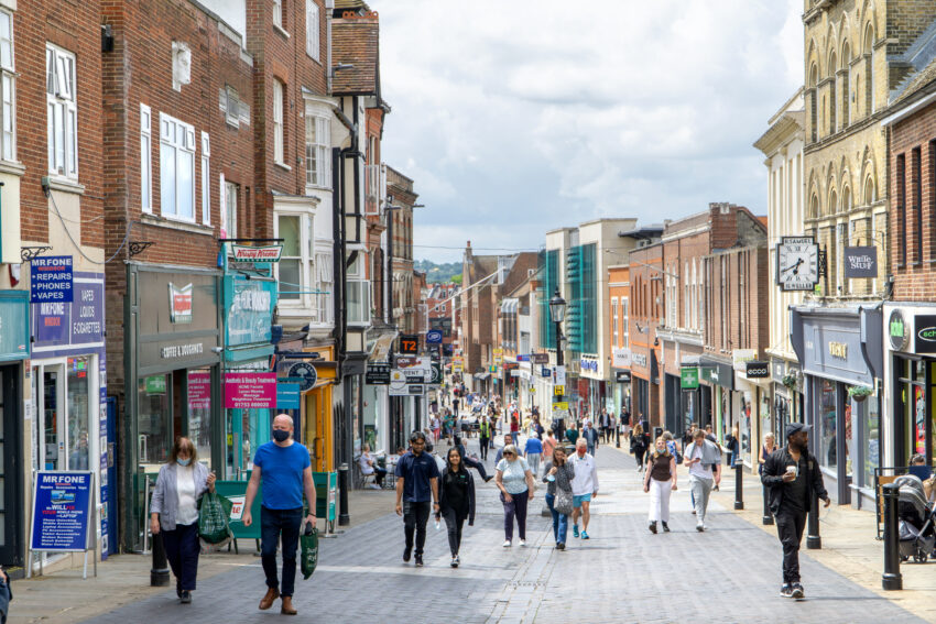 Retail prices in the UK have dropped for the first time in nearly three years, as retailers heavily discounted summer stock, particularly in fashion and household goods sectors.